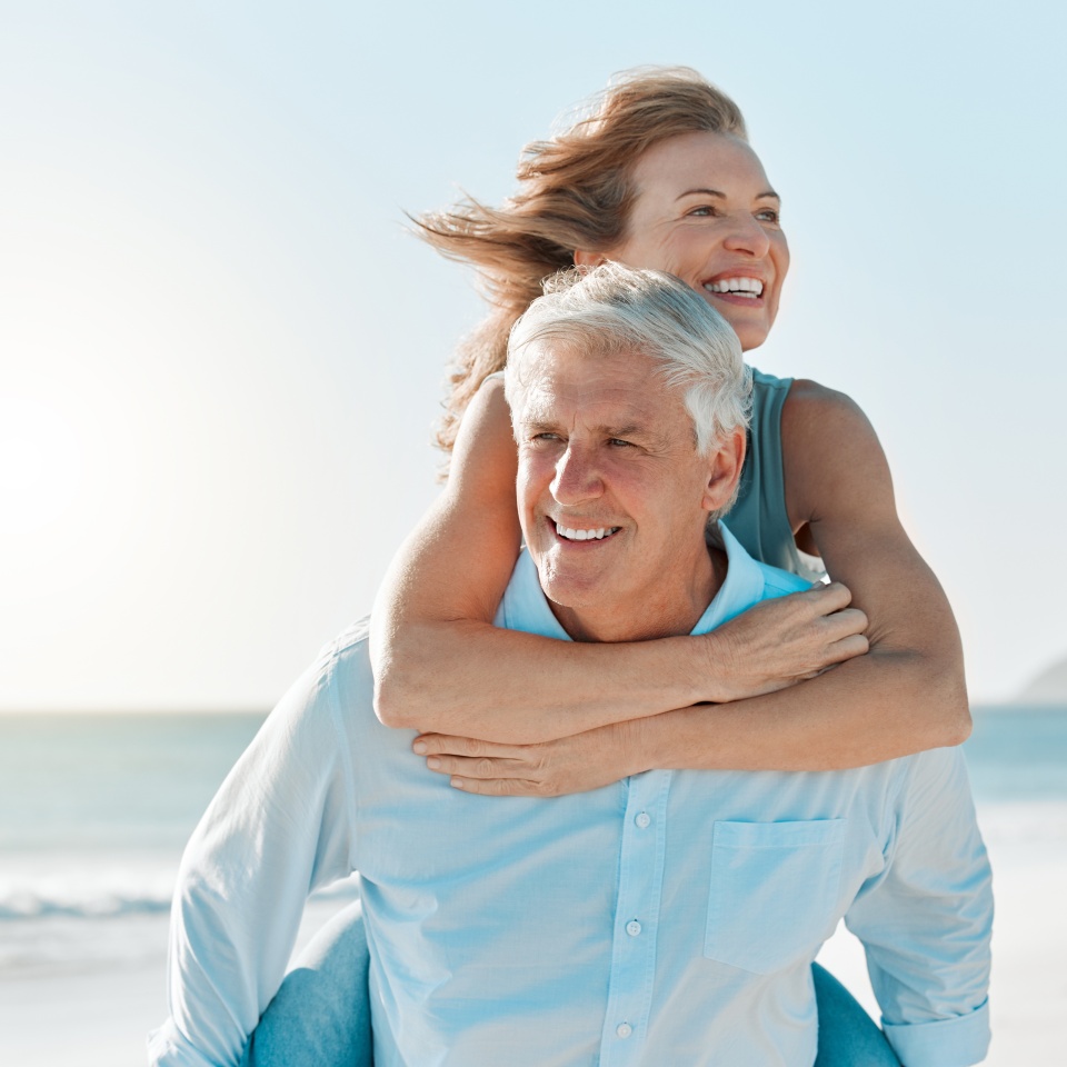 Love, piggyback and walking with old couple at beach for travel destination, summer and anniversary vacation. Relax, tropical and retirement with senior people for holiday, bonding and romance